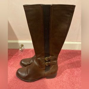 8.5 brown boots with 1-1.5 inch heel. lightly worn.